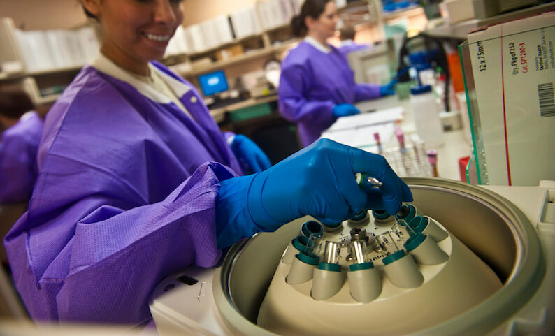 A health worker in a medical lab