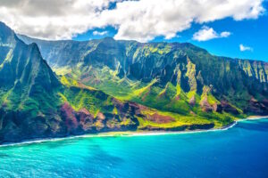 Landscape of Hawaiian Mountains against the ocean