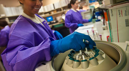 A health worker in a medical lab
