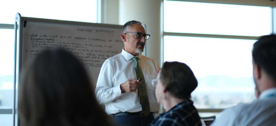 Future Focused Executive Director, Tony Monfiletto at the front of a classroom.